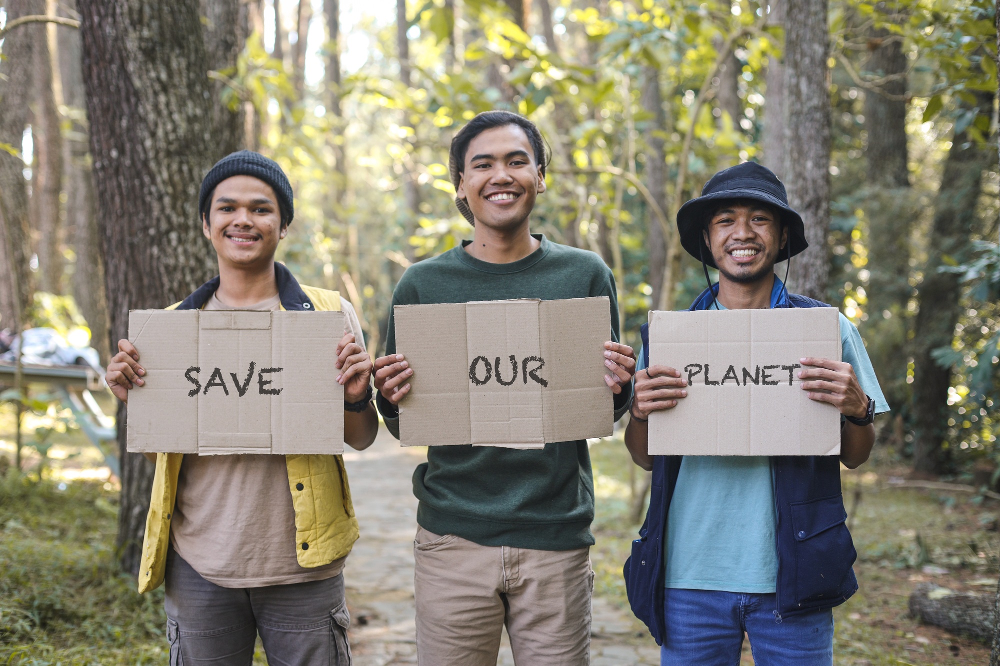 Diverse men with statement for clean and safe nature. Save Our Planet.